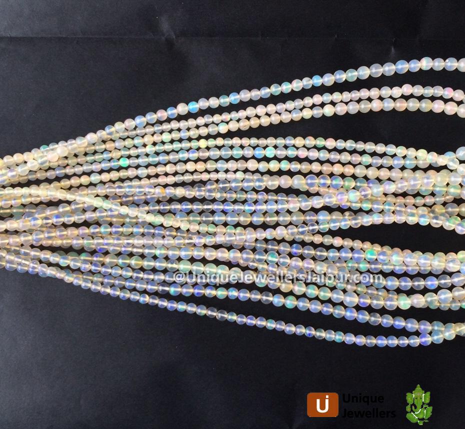 Yellowish White Ethiopian Opal Smooth Round Beads